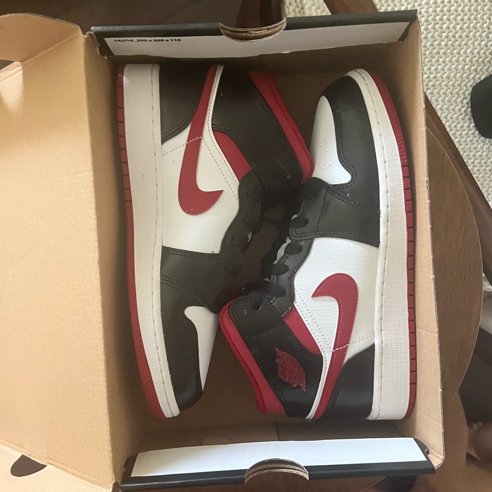 Nike Air Jordan Retro 1 Sneakers in Black, Red, and White